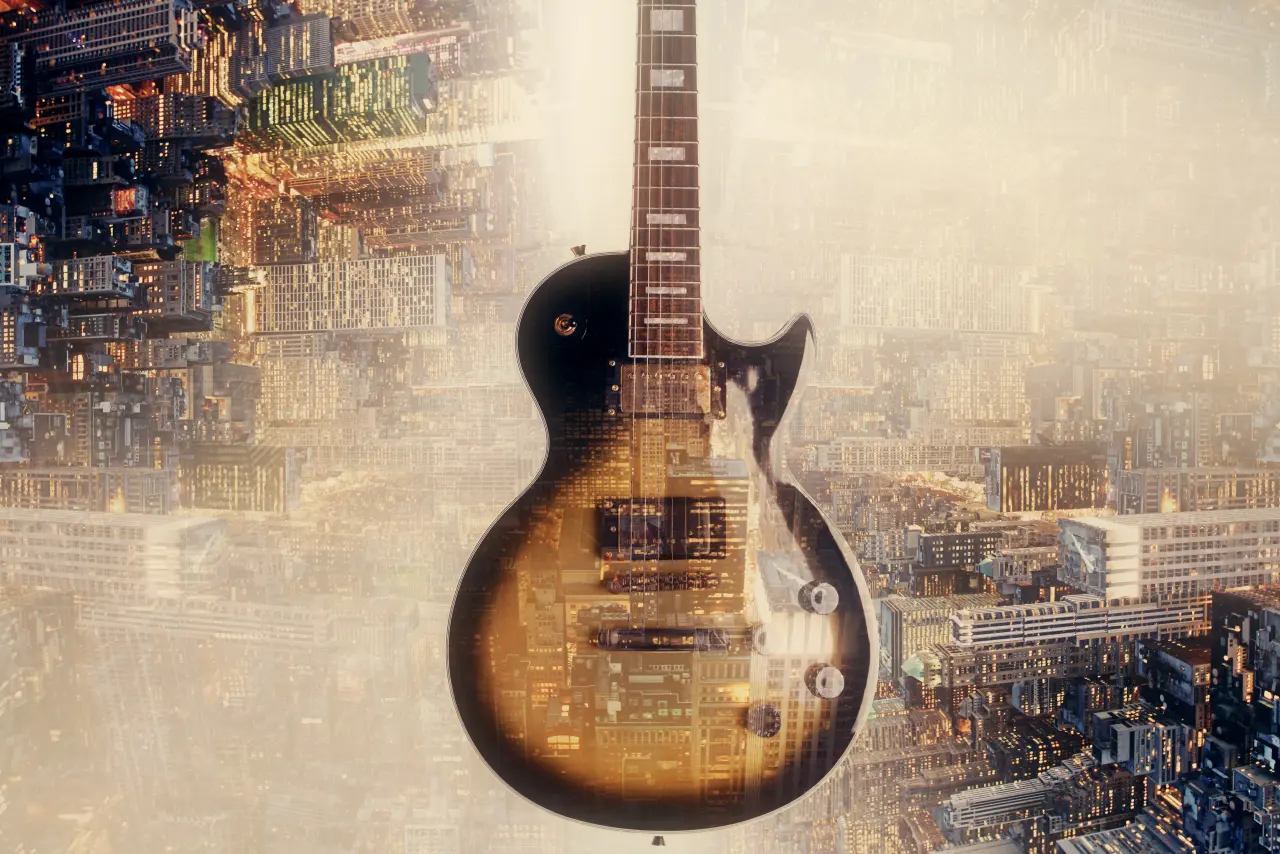 Composición de una guitarra y un paisaje urbano. Imagen editorial.